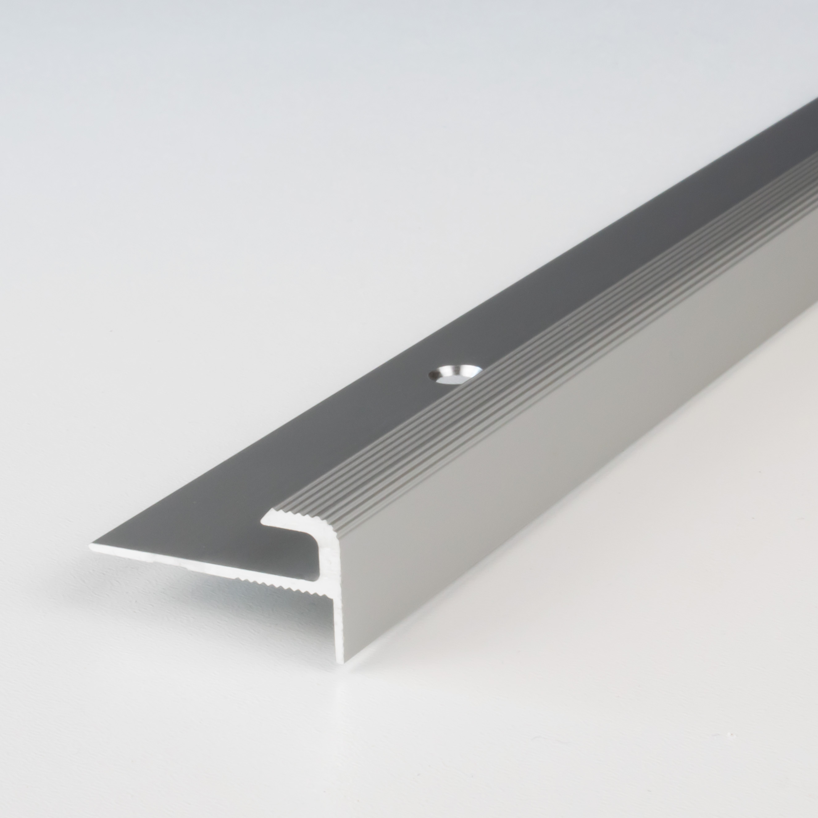 Profilé à emboîter | nez pour revêtement design | aluminium anodisé | à visser